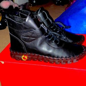 Brand New Black Sneaker Boot with fur inside size 8. Very cute and comfortable